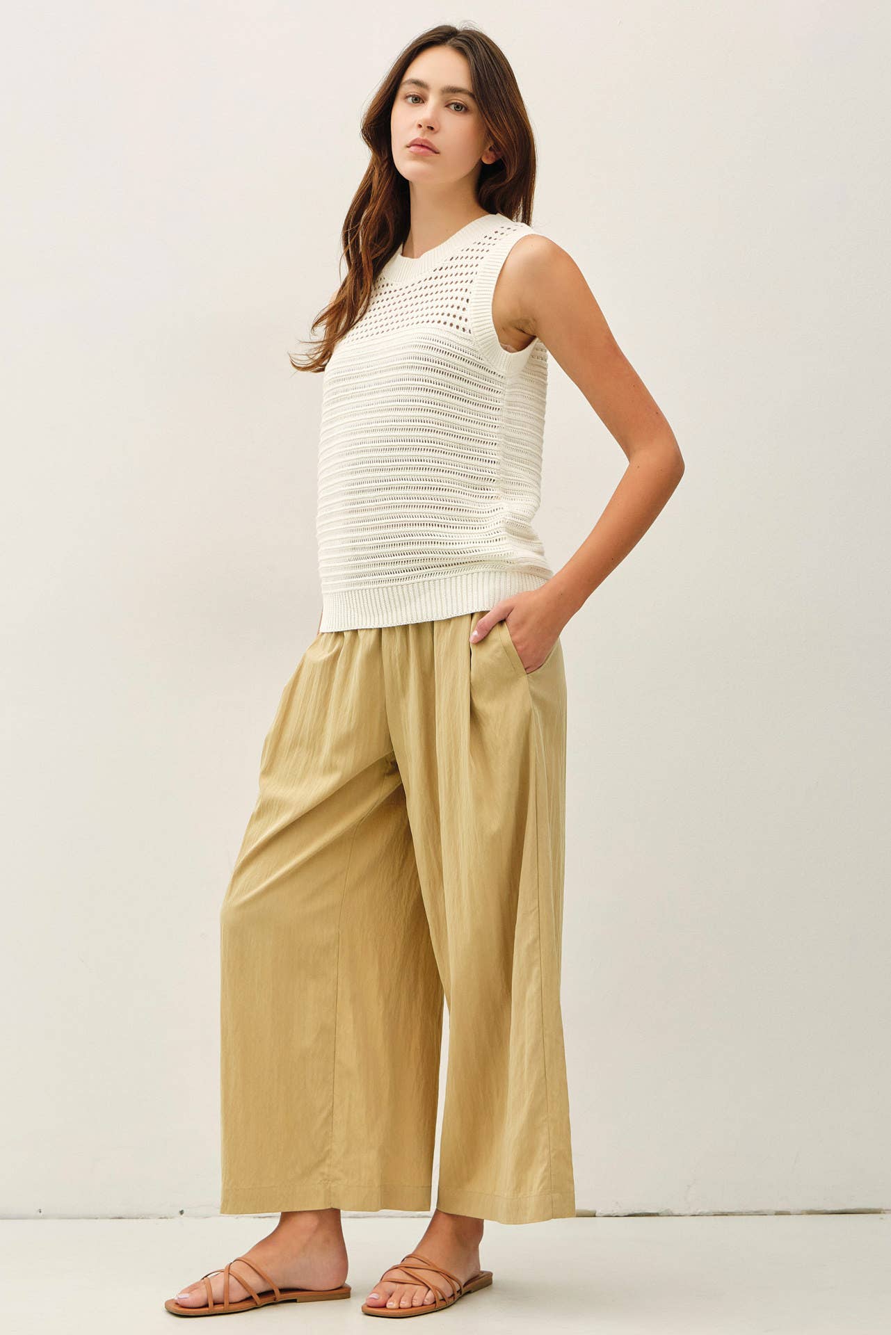 Textured Cream Sleeveless Sweater Top
